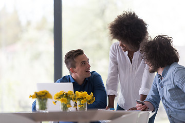 Image showing Multiethnic startup business team on meeting