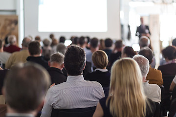 Image showing Business speaker giving a talk at business conference event.