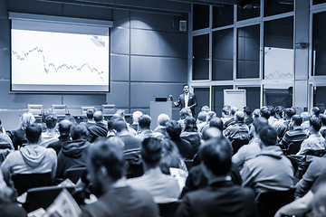 Image showing Business speaker giving a talk at business conference event.