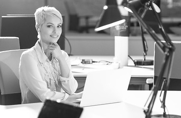 Image showing Businesswoman using laptop at work