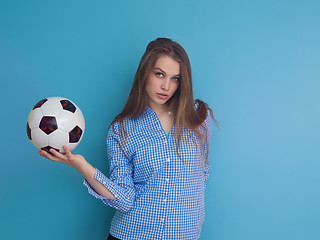 Image showing young woman playing with a soccer ball