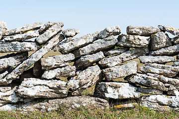 Image showing Old limestone stone wall closeup