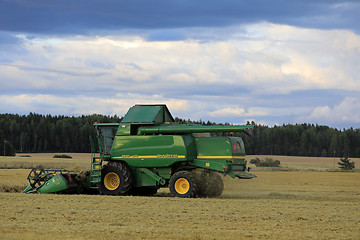 Image showing Dusktime John Deere Harvest
