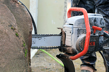 Image showing Sawing Stone with ICS Chain Saw 