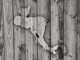 Image showing Map of Central America on weathered wood