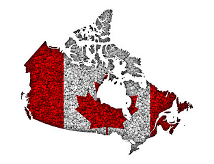 Image showing Map and flag of Canada on poppy seeds