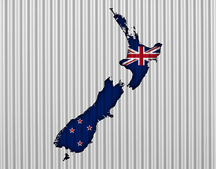 Image showing Map and flag of New Zealand on corrugated iron,