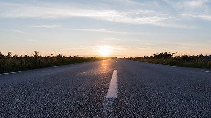 Image showing Extreme low angle view at an asphalt road