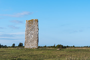 Image showing Ancient standing stone in a plain landscape