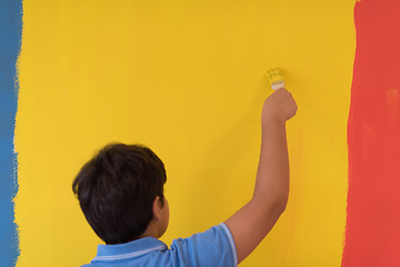 Image showing Portrait of a happy young boy painter