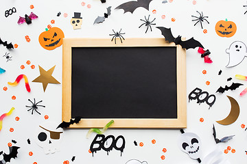 Image showing blank chalkboard and halloween party decorations