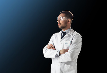 Image showing scientist in lab coat and safety glasses