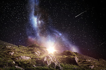 Image showing rocky landscape over night sky or space