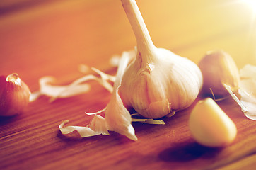 Image showing close up of garlic on wooden table