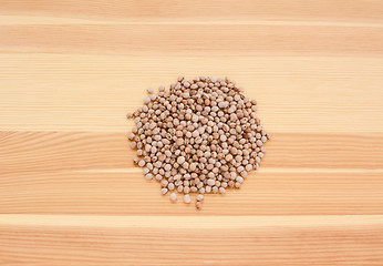 Image showing Pigeon peas on wood