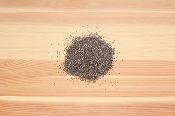 Image showing Chia seeds on wood
