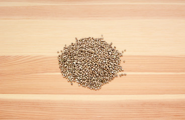 Image showing Hemp seeds on wood