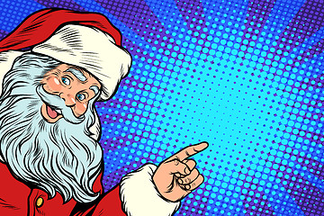 Image showing Santa Claus pointing to copy space