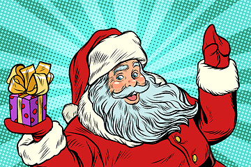 Image showing Santa Claus with gift. New year and Christmas