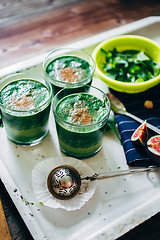 Image showing Green smoothies with leaves of fresh mint