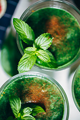 Image showing Green smoothies with leaves of fresh mint