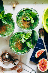 Image showing Green smoothies with leaves of fresh mint