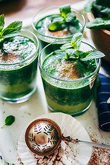 Image showing Green smoothies with leaves of fresh mint