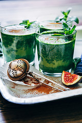 Image showing Green smoothies with leaves of fresh mint