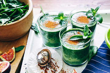 Image showing Green smoothies with leaves of fresh mint