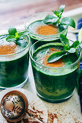 Image showing Green smoothies with leaves of fresh mint