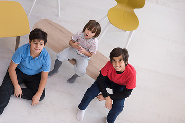 Image showing boys in a new modern home