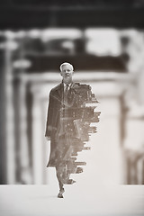 Image showing Double exposure of senior businessman