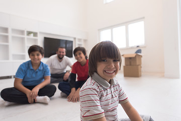 Image showing portrait of happy young boys with their dad