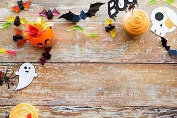 Image showing halloween party paper decorations and treats