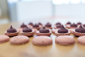 Image showing macarons on table at confectionery or bakery