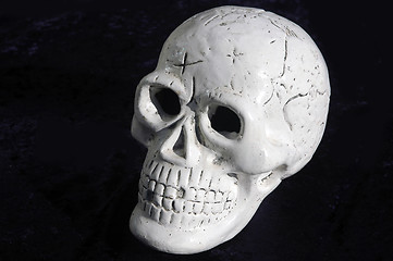Image showing glass skull against black background