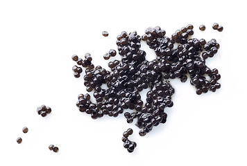 Image showing natural black caviar isolated on white background