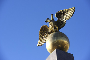 Image showing Two headed golden eagle obelisk in the market square in Helsinki