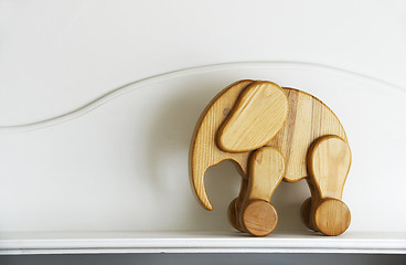 Image showing wooden elephant sculpture on a neutral 