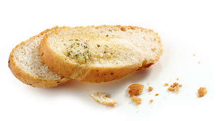 Image showing grilled bread slices and crumbs