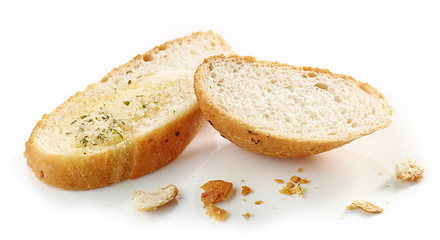 Image showing grilled bread slices and crumbs