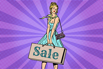 Image showing Beautiful young woman on sale