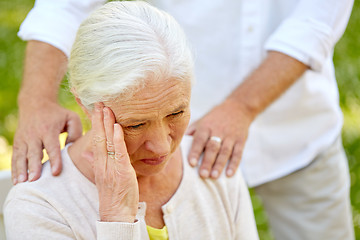 Image showing close up of senior woman suffering from headache