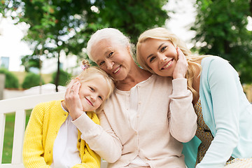 Image showing woman with daughter and senior mother at park