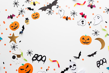 Image showing halloween party paper decorations and sweets