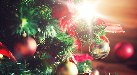 Image showing close up of christmas tree decorated with balls