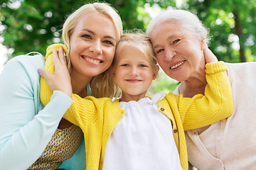 Image showing woman with daughter and senior mother at park