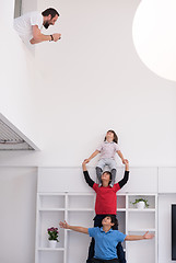 Image showing young boys posing line up piggyback