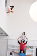 Image showing young boys posing line up piggyback