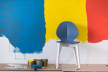 Image showing empty chair and equipment for painting